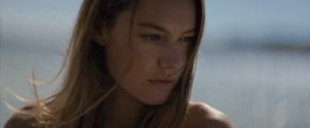 Movie still from “No Limit” (2022), directed by David M. Rosenthal – A person with long hair; Close Up shot, Low angle