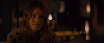 Movie still from “No Limit” (2022), directed by David M. Rosenthal – A person sitting in front of a window; Close Up shot, Over the shoulder angle