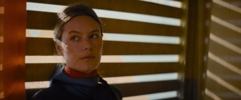 Movie still from “No Limit” (2022), directed by David M. Rosenthal – A person wearing a jacket; Close Up shot, Low angle