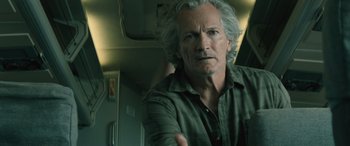 Movie still from “No One Will Save You” (2023), directed by Brian Duffield – A person with long white hair; Close Up shot, Low angle