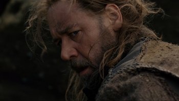 Movie still from “Noah” (2014), directed by Darren Aronofsky – A person with long hair and a beard; Close Up shot, Over the shoulder angle