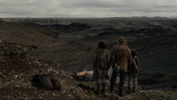 Movie still from “Noah” (2014), directed by Darren Aronofsky – A group of people standing on top of a hill; Wide shot, High angle