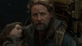 Movie still from “Noah” (2014), directed by Darren Aronofsky – A person with long hair and a beard; Close Up shot, Low angle