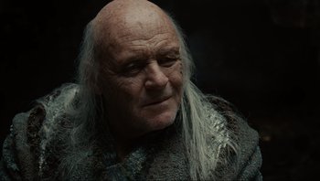 Movie still from “Noah” (2014), directed by Darren Aronofsky – An old man with long white hair and a bald head; Close Up shot, Over the shoulder angle