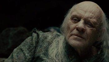 Movie still from “Noah” (2014), directed by Darren Aronofsky – An old man with a long white beard; Close Up shot, Over the shoulder angle