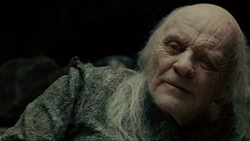 Movie still from “Noah” (2014), directed by Darren Aronofsky – An old man with white hair and a long white beard; Close Up shot, Over the shoulder angle