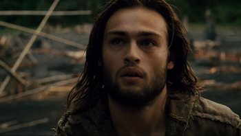 Movie still from “Noah” (2014), directed by Darren Aronofsky – A person with long brown hair; Close Up shot, Low angle