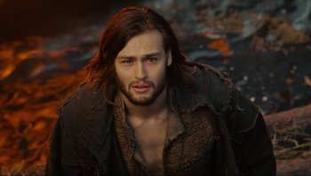 Movie still from “Noah” (2014), directed by Darren Aronofsky – A person with long brown hair; Close Up shot, High angle