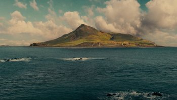 Movie still from “Noah” (2014), directed by Darren Aronofsky – A large body of water with a mountain in the background; Extreme Wide shot, High angle