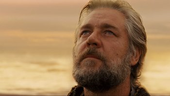 Movie still from “Noah” (2014), directed by Darren Aronofsky – A person with a beard looking up; Close Up shot, Low angle