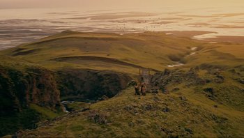 Movie still from “Noah” (2014), directed by Darren Aronofsky – Two people standing on a hill overlooking a valley; Extreme Wide shot, High angle