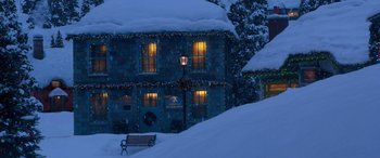 Movie still from “Noelle” (2019), directed by Marc Lawrence – A house with lights and a bench in front of it; Extreme Wide shot, High angle