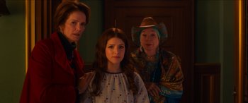 Movie still from “Noelle” (2019), directed by Marc Lawrence – A group of women standing next to each other; Medium shot, Over the shoulder angle