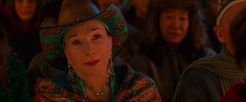 Movie still from “Noelle” (2019), directed by Marc Lawrence – A person wearing a cowboy hat; Close Up shot, Over the shoulder angle
