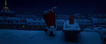 Movie still from “Noelle” (2019), directed by Marc Lawrence – A man dressed as santa claus walking on a roof; Extreme Wide shot, High angle