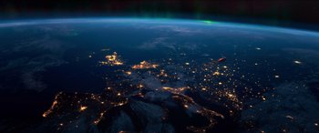 Movie still from “Noelle” (2019), directed by Marc Lawrence – A view of the earth at night from space; Extreme Wide shot, High angle