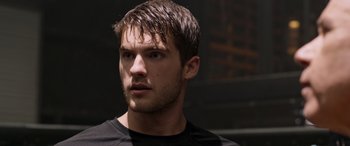 Movie still from “Notorious Nick” (2021), directed by Aaron Leong – A person with wet hair; Close Up shot, Low angle