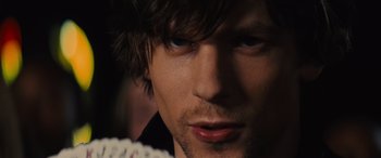 Movie still from “Now You See Me” (2013), directed by Louis Leterrier – A person wearing a black shirt; Close Up shot, Over the shoulder angle