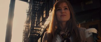 Movie still from “Now You See Me” (2013), directed by Louis Leterrier – A woman standing in front of a fire hydrant; Close Up shot, Low angle