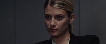 Movie still from “Now You See Me” (2013), directed by Louis Leterrier – A person wearing a suit; Close Up shot, Low angle