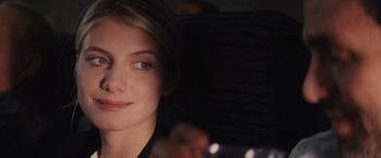 Movie still from “Now You See Me” (2013), directed by Louis Leterrier – A woman's face in the dark; Close Up shot, Over the shoulder angle