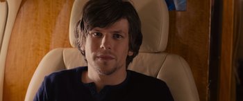 Movie still from “Now You See Me” (2013), directed by Louis Leterrier – A person sitting in a chair; Close Up shot, Over the shoulder angle