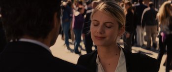 Movie still from “Now You See Me” (2013), directed by Louis Leterrier – A woman in black jacket and a man in black jacket; Close Up shot, Over the shoulder angle