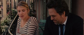 Movie still from “Now You See Me” (2013), directed by Louis Leterrier – A man and a woman sitting next to each other on a bench; Close Up shot, Over the shoulder angle