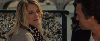 Movie still from “Now You See Me” (2013), directed by Louis Leterrier – A woman standing in front of a wall covered in locks; Close Up shot, Over the shoulder angle