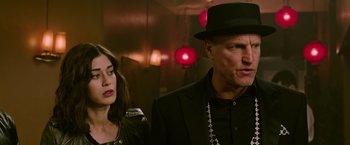 Movie still from “Now You See Me 2” (2016), directed by Jon M. Chu – A man and a woman standing next to each other in a room; Close Up shot, Low angle