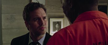 Movie still from “Now You See Me 2” (2016), directed by Jon M. Chu – A person talking to another person; Close Up shot, Over the shoulder angle