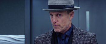 Movie still from “Now You See Me 2” (2016), directed by Jon M. Chu – A person wearing a hat; Close Up shot, Low angle