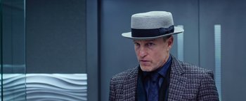 Movie still from “Now You See Me 2” (2016), directed by Jon M. Chu – A man wearing a hat and a suit; Close Up shot, Low angle