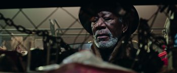 Movie still from “Now You See Me 2” (2016), directed by Jon M. Chu – An older man wearing a hat and a fur coat; Close Up shot, Low angle