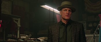 Movie still from “Now You See Me 2” (2016), directed by Jon M. Chu – A man wearing a hat and a suit; Close Up shot, Low angle