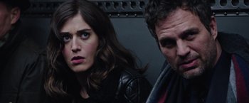 Movie still from “Now You See Me 2” (2016), directed by Jon M. Chu – A man and a woman sitting next to each other on a train; Close Up shot, Low angle