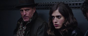 Movie still from “Now You See Me 2” (2016), directed by Jon M. Chu – A man and a woman are standing next to each other; Close Up shot, Over the shoulder angle