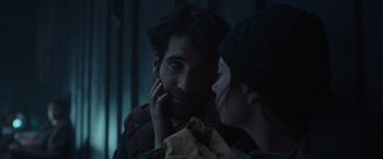 Movie still from “Nowhere” (2023), directed by Albert Pintó – A man and a woman looking at one another; Close Up shot, Over the shoulder angle