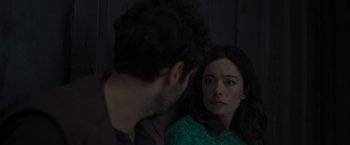Movie still from “Nowhere” (2023), directed by Albert Pintó – A man and a woman looking at each other in the dark; Close Up shot, Over the shoulder angle