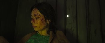 Movie still from “Nowhere” (2023), directed by Albert Pintó – A woman with blood all over her face; Close Up shot, High angle