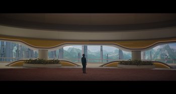 Movie still from “Obi-Wan Kenobi: A Jedi's Return” (2022), directed by David Gelb – A man standing in front of a large window with mountains in the background; Extreme Wide shot, Low angle