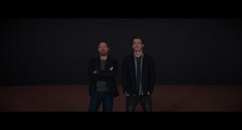 Movie still from “Obi-Wan Kenobi: A Jedi's Return” (2022), directed by David Gelb – A couple of men standing next to each other; Medium shot, Low angle