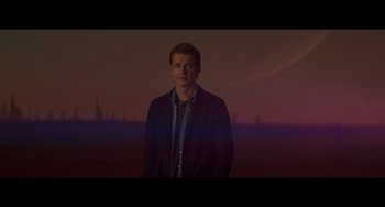 Movie still from “Obi-Wan Kenobi: A Jedi's Return” (2022), directed by David Gelb – A man standing in front of an ocean at night; Medium shot, Over the shoulder angle