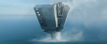 Movie still from “Oblivion” (2013), directed by Joseph Kosinski – An image of a ship in the water; Extreme Wide shot, Low angle