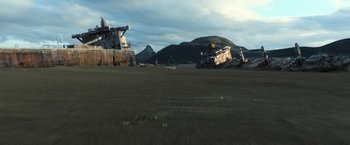 Movie still from “Oblivion” (2013), directed by Joseph Kosinski – An abandoned ship in the middle of a field; Extreme Wide shot, High angle