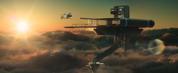 Movie still from “Oblivion” (2013), directed by Joseph Kosinski – An image of an airplane in the sky above the clouds; Extreme Wide shot, Low angle