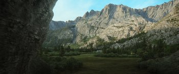 Movie still from “Oblivion” (2013), directed by Joseph Kosinski – A view of a mountain range with trees in the foreground; Extreme Wide shot, High angle