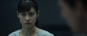 Movie still from “Oblivion” (2013), directed by Joseph Kosinski – A person wearing a blue shirt; Close Up shot, Over the shoulder angle