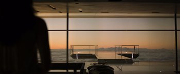 Movie still from “Oblivion” (2013), directed by Joseph Kosinski – A view of the sky from the window of an airplane; Extreme Wide shot, Low angle