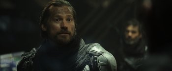 Movie still from “Oblivion” (2013), directed by Joseph Kosinski – A person wearing armor; Close Up shot, Over the shoulder angle
